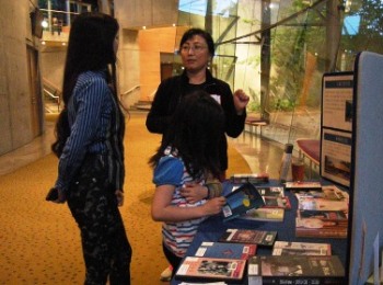 Jing introducing library collections to a participant